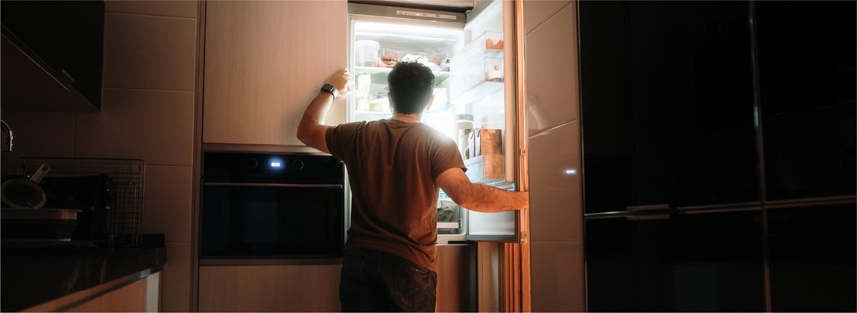Man with smart fridge tech