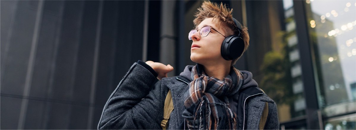 man with sunglasses and headphones on