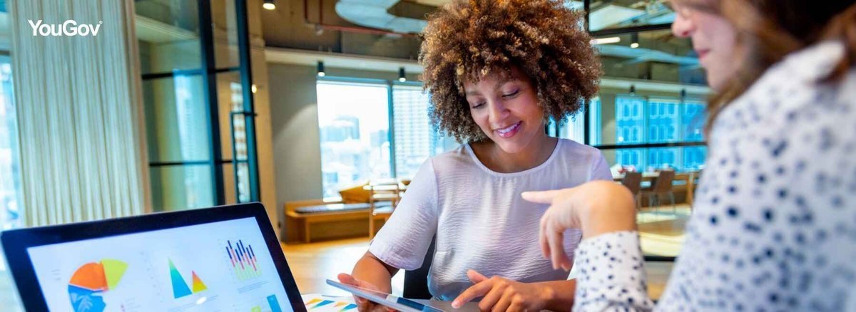 Two young females in an office