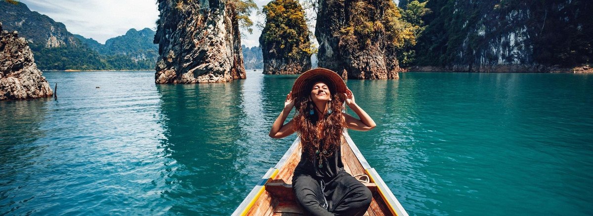 A woman is sitting on the boat
