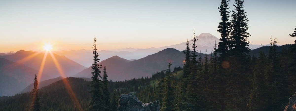 Sunset over the Cascade Range of mountains at Goat Rocks Wilderness. - stock photo