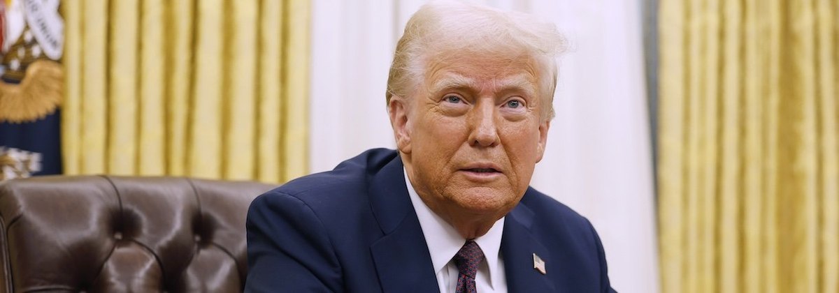 WASHINGTON, DC - JANUARY 23: U.S. President Donald Trump speaks to reporters after signing a series of executive orders in the Oval Office of the White House on January 23, 2025 in Washington, DC. Trump signed a range of executive orders pertaining to iss