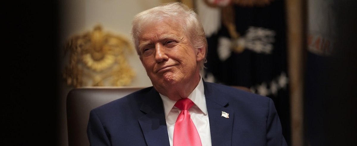 WASHINGTON, DC - DECEMBER 02: U.S. President Donald Trump looks on during a meeting of his Cabinet in the Cabinet Room of the White House on December 02, 2025 in Washington, DC. A bipartisan Congressional investigation has begun regarding Secretary of War