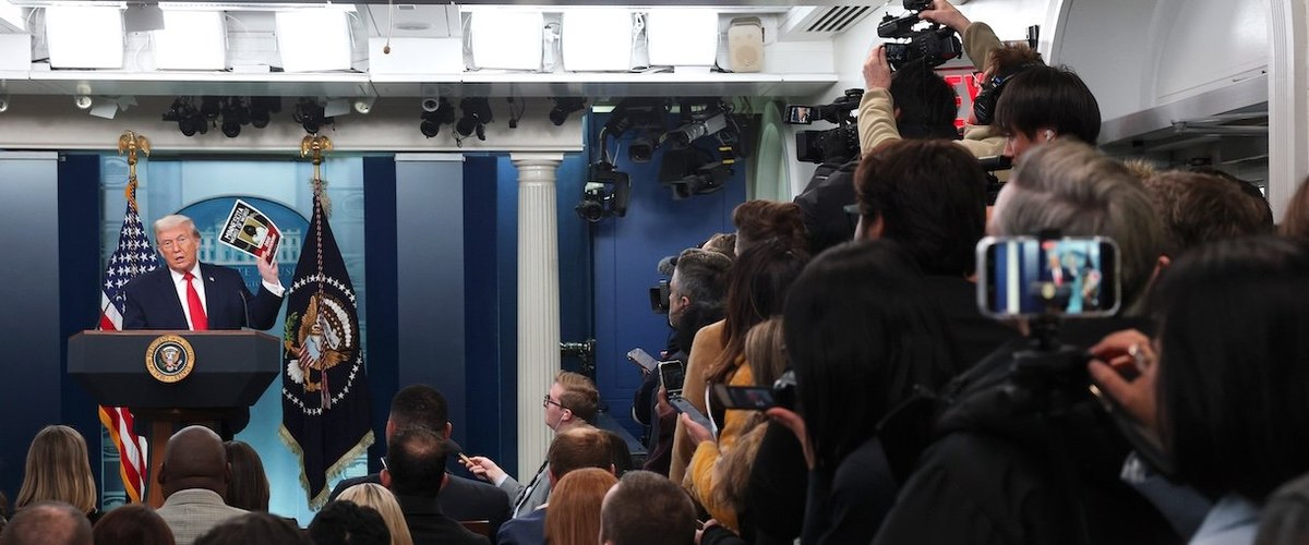 WASHINGTON, DC - JANUARY 20: U.S. President Donald Trump displays a photo of what he says is an illegal immigrant who was arrested in Minnesota during a press briefing in the James S. Brady Press Briefing Room of the White House on January 20, 2026 in Washington, DC. White House Press Secretary Karoline Leavitt was joined by President Trump days after the president threatened a 10% import tax on goods from eight European countries that have rallied around Denmark amid Trump's calls for the U.S. to take control of Greenland, a semi-autonomous Danish territory. (Photo by Kevin Dietsch/Getty Imag