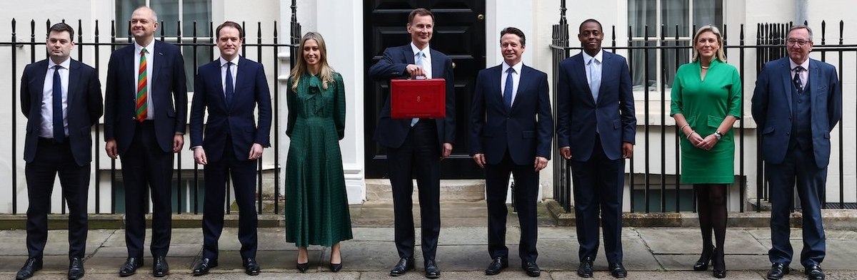 LONDON, ENGLAND - MARCH 6: The Chancellor Of The Exchequer Jeremy Hunt poses with members of the Treasury staff as he leaves 11 Downing Street to deliver the Budget on March 6, 2024 in London, England. Chancellor Jeremy Hunt delivers his 2024 Spring Budge