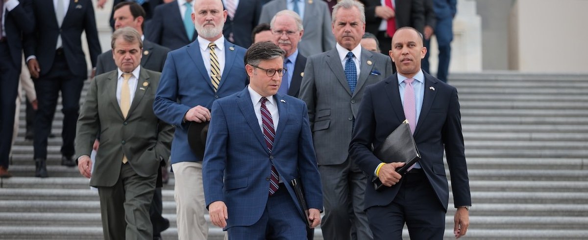Speaker of the House Rep. Mike Johnson (R-LA)(L) and House Minority Leader Rep. Hakeem Jeffries (D-NY) (R) walk down the House steps during a memorial vigil hosted by Johnson and Jeffries outside of the U.S. Capitol on June 10, 2025 in Washington, DC.