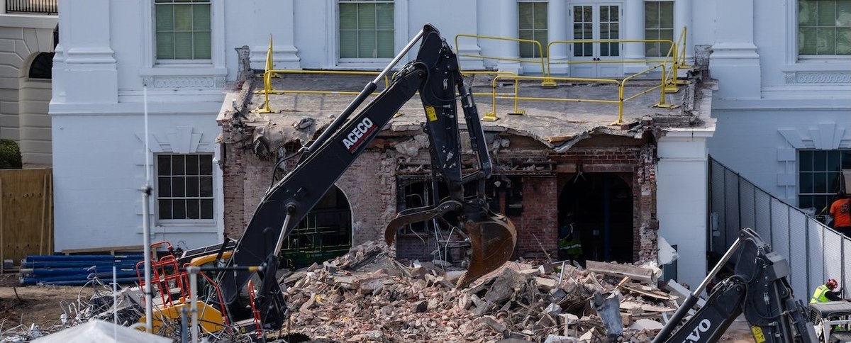 An excavator works to clear rubble after the East Wing of the White House was demolished on October 23, 2025 in Washington, DC. The demolition is part of U.S. President Donald Trump's plan to build a ballroom reportedly costing at least $250 million on th