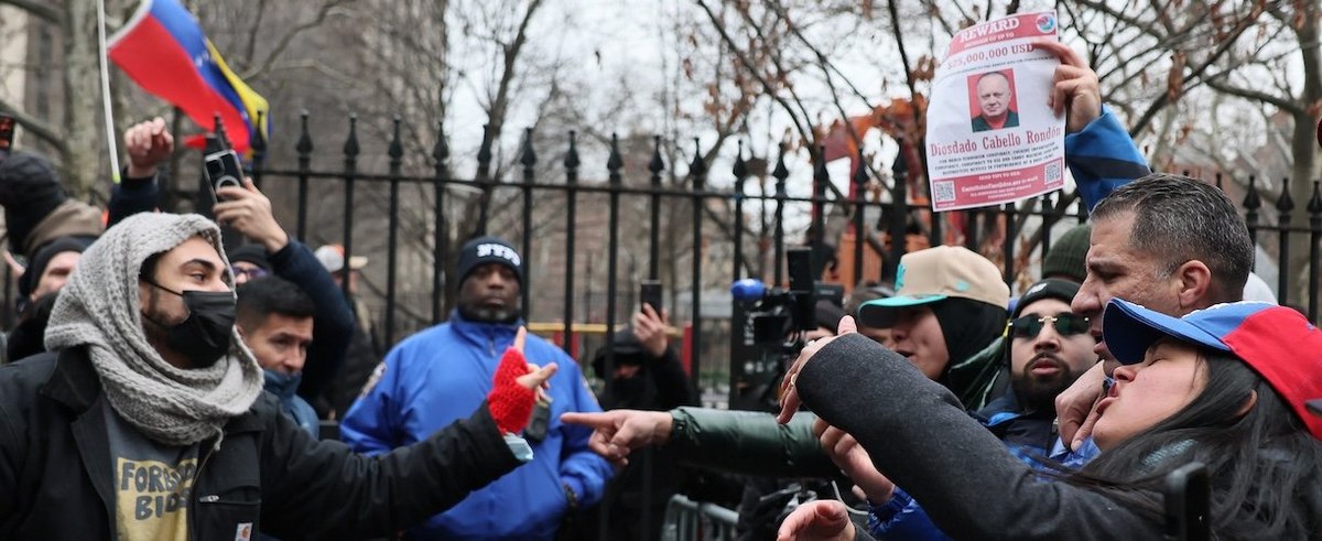 NEW YORK, NEW YORK - JANUARY 05: People in support of President of Venezuela Nicolas Maduro confront opposition outside of Daniel Patrick Moynihan United States Courthouse before President of Venezuela Nicolas Maduro's and first lady Cilia Flores on Janua