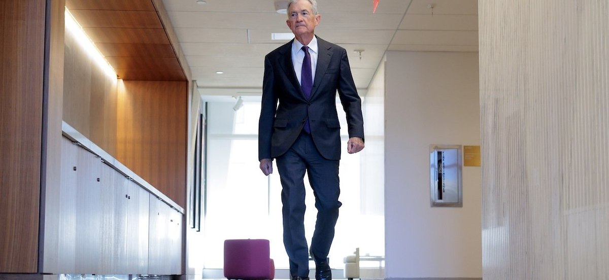 WASHINGTON, DC - JANUARY 13: Federal Reserve Chairman Jerome Powell walks between meetings at the Fed on January 13, 2026 in Washington, DC. The U.S. Justice Department announced that it is opening a criminal investigation of Powell, who later said, "Public service sometimes requires standing firm in the face of threats." (Photo by Chip Somodevilla/Getty Images)