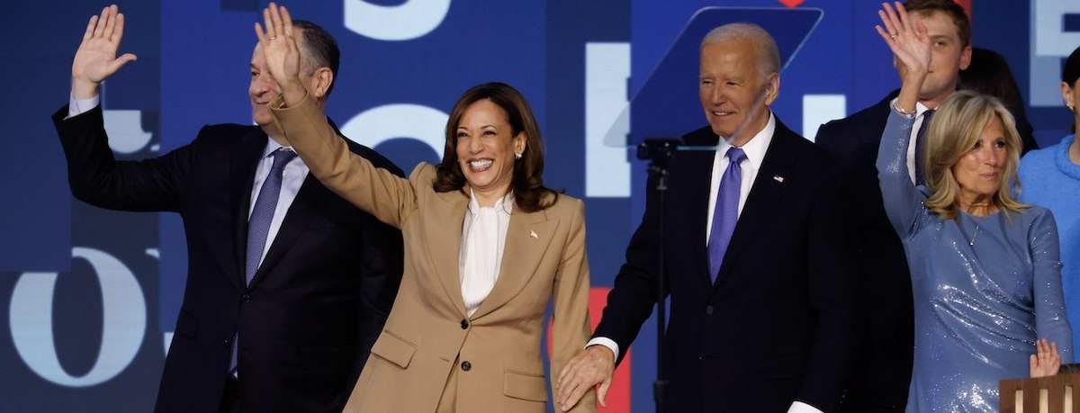 CHICAGO, ILLINOIS - AUGUST 19: (L-R) Second Gentleman Doug Emhoff, Democratic presidential candidate, U.S. Vice President Kamala Harris, U.S. President Joe Biden and First Lady Jill Biden onstage at the end of the first day of the Democratic National Conv