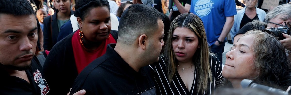 BALTIMORE, MARYLAND - AUGUST 25: Surrounded by reporters, Kilmar Abrego Garcia and his wife Jennifer Vasquez Sura enter a U.S. Immigration and Customs Enforcement (ICE) field office on August 25, 2025 in Baltimore, Maryland. The U.S. Government is threate
