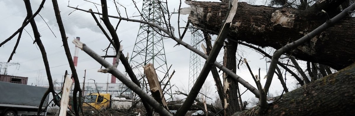 KYIV, UKRAINE - JANUARY 26: Broken tree limbs and other debris litter the ground at an industrial area in Kyiv following a morning missile strike that left one person dead and two wounded on January 26, 2023 in Kyiv, Ukraine. Air sirens sounded across Ukr