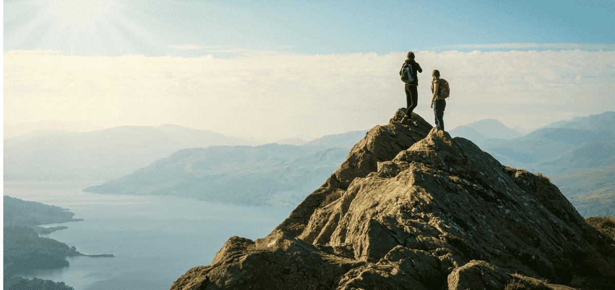 Image of people on a top of a mountain