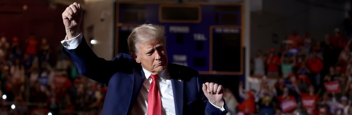 GREENVILLE, NORTH CAROLINA - OCTOBER 21: Republican presidential nominee, former U.S. President Donald Trump leaves the stage following a campaign rally at Williams Arena at Minges Coliseum on October 21, 2024 in Greenville, North Carolina. Trump is campa