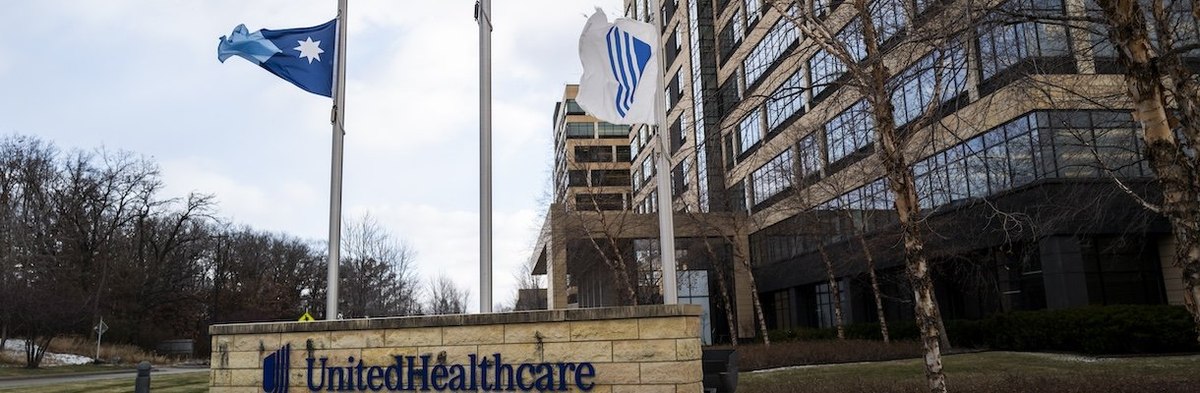 MINNETONKA, MINNESOTA - DECEMBER 4: Flags fly at half mast outside the United Healthcare corporate headquarters on December 4, 2024 in Minnetonka, Minnesota. United Healthcare CEO Brian Thompson was shot dead on the street in New York City before he was t