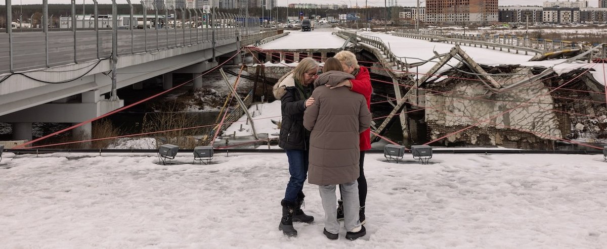 IRPIN, UKRAINE - FEBRUARY 24: People gather at the Irpin bridge in commemoration of the 4th anniversary of the war on February 24, 2026 in Irpin, Ukraine. Today marks four years since Russia launched its full-scale invasion of Ukraine on February 24, 2022. (Photo by Diego Fedele/Getty Images)