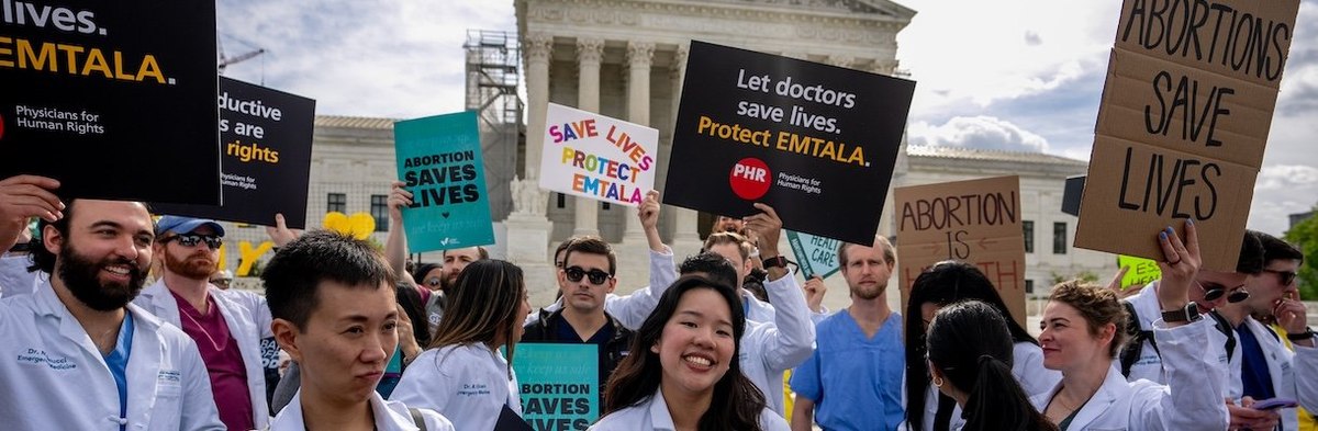 WASHINGTON, DC - APRIL 24: A group of doctors join abortion rights supporters at a rally outside the Supreme Court on April 24, 2024 in Washington, DC. The Supreme Court hears oral arguments today on Moyle v. United States and Idaho v. United States to de
