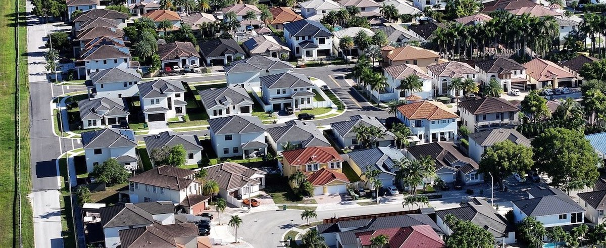 MIAMI, FLORIDA - AUGUST 01: An aerial view of single family homes on August 01, 2025 in Miami, Florida. Home sales have fallen across South Florida as high interest rates and other factors have weighed on the market. (Photo by Joe Raedle/Getty Images)
