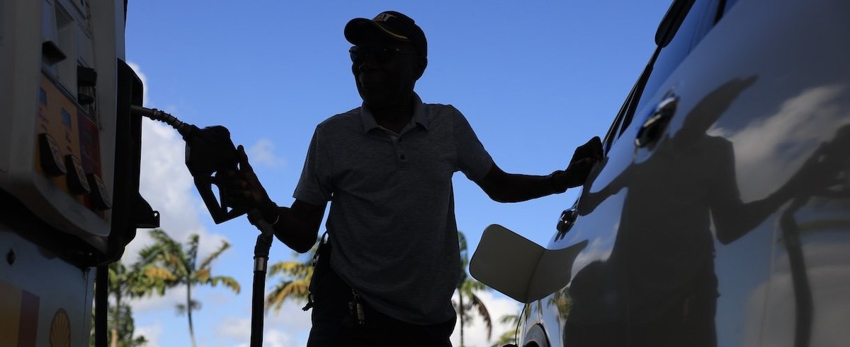 MIAMI, FLORIDA - OCTOBER 24: A customer pumps gas into their vehicle on October 24, 2025 in Miami, Florida. According to the new Bureau of Labor Statistics data released on October 24, the 12-month inflation rate climbed to 3 percent in September, up from 2.9 percent in August, as gasoline prices rose by 4.1 percent, a major driver of inflation last month. (Photo by Joe Raedle/Getty Images)