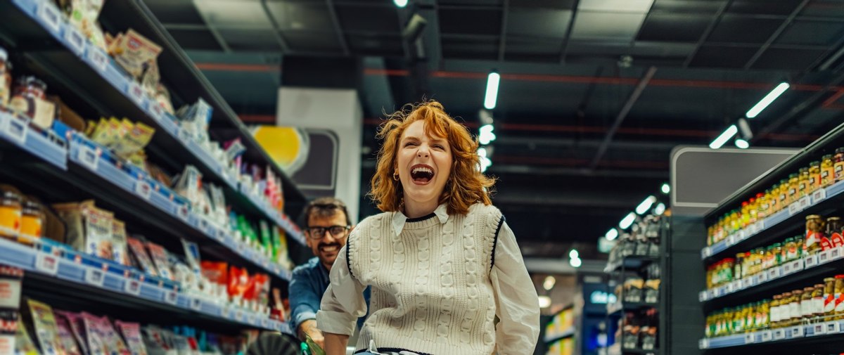 happy woman in shopping cart