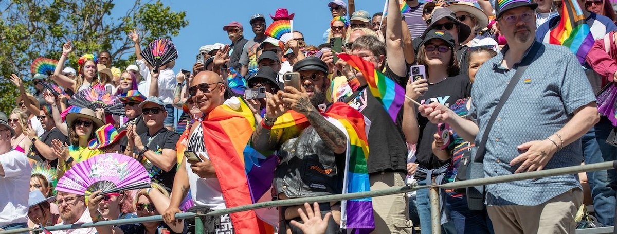 SAN FRANCISCO, CALIFORNIA - JUNE 30: People gather to watch the 54rd Annual San Francisco Pride Parade on June 30, 2024 in San Francisco, California. (Photo by Miikka Skaffari/Getty Images)